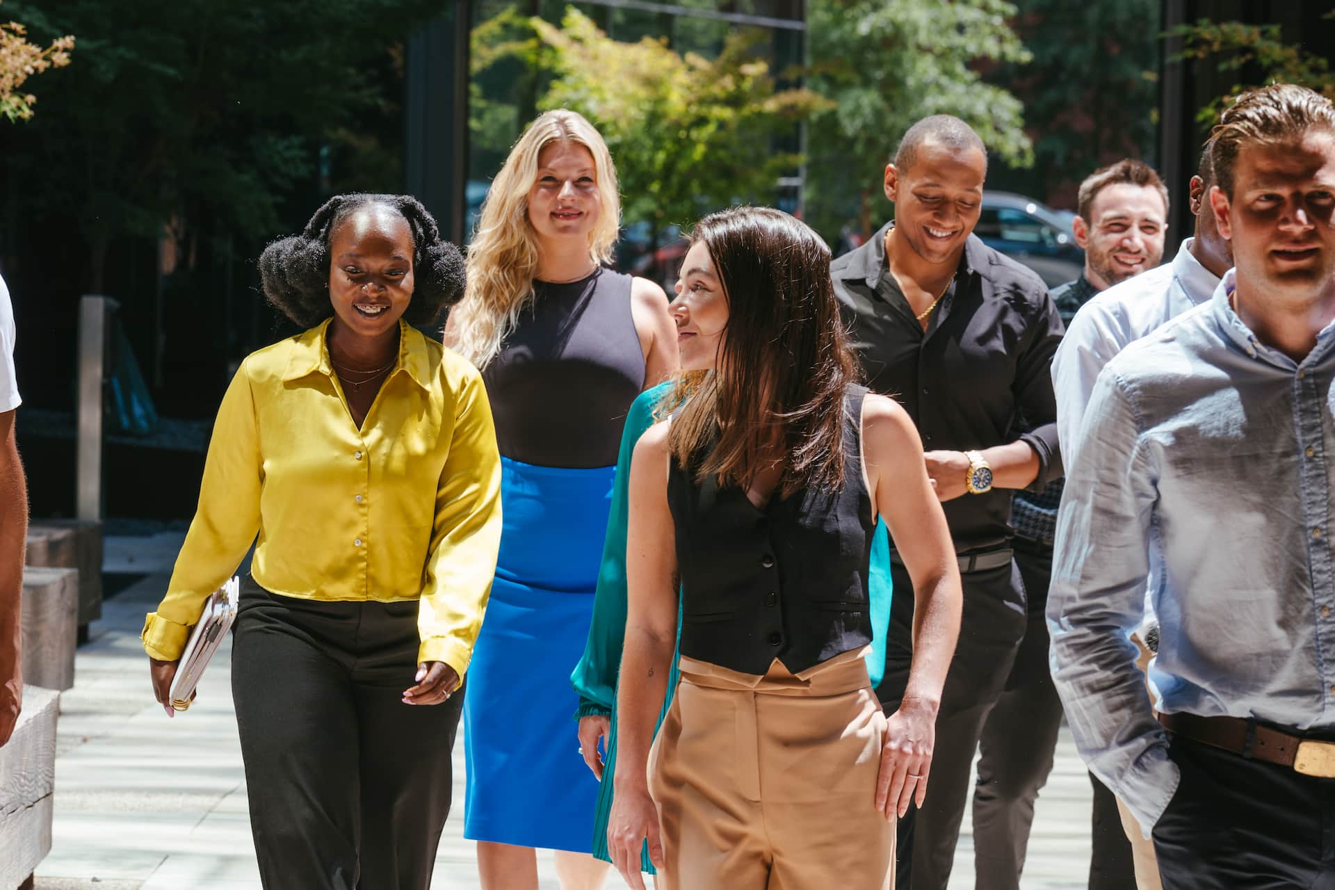 Corporate employees on a group wellness walk during a WorkLife Wellness retreat